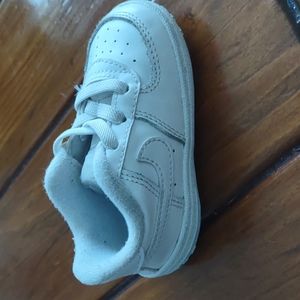 Baby Nikes size 4
